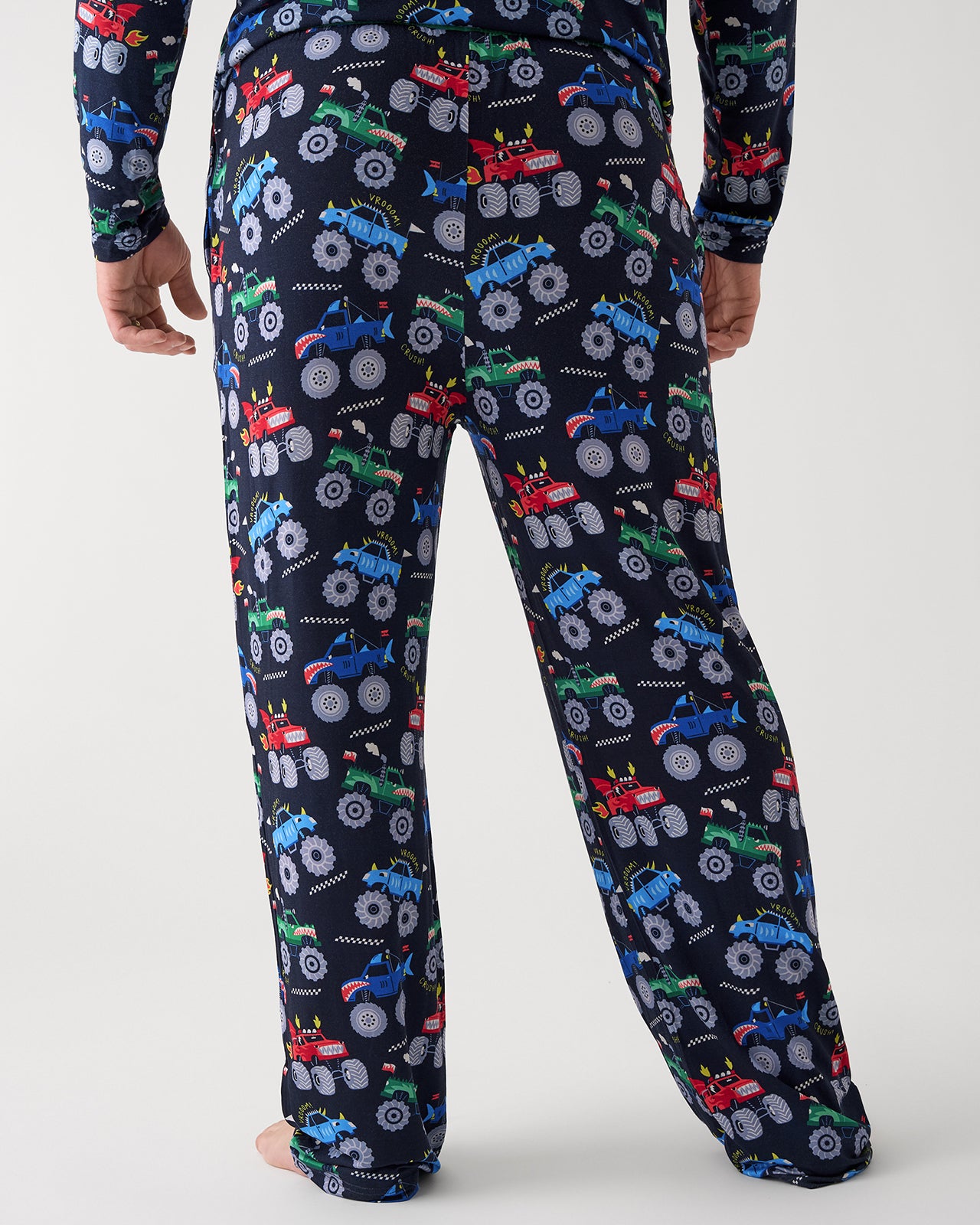 Back view of man wearing the Monster Truck Madness Men's Pajama Pants