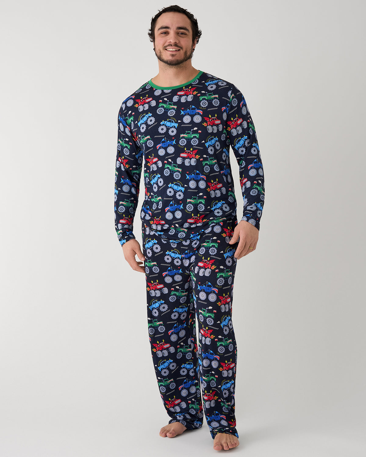 Man wearing the Monster Truck Madness Men's Long Sleeve Pajama Top and Pants