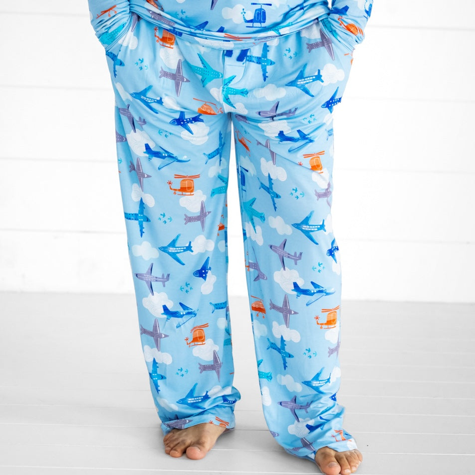 close up image of a man wearing Lets Fly men's pj pants