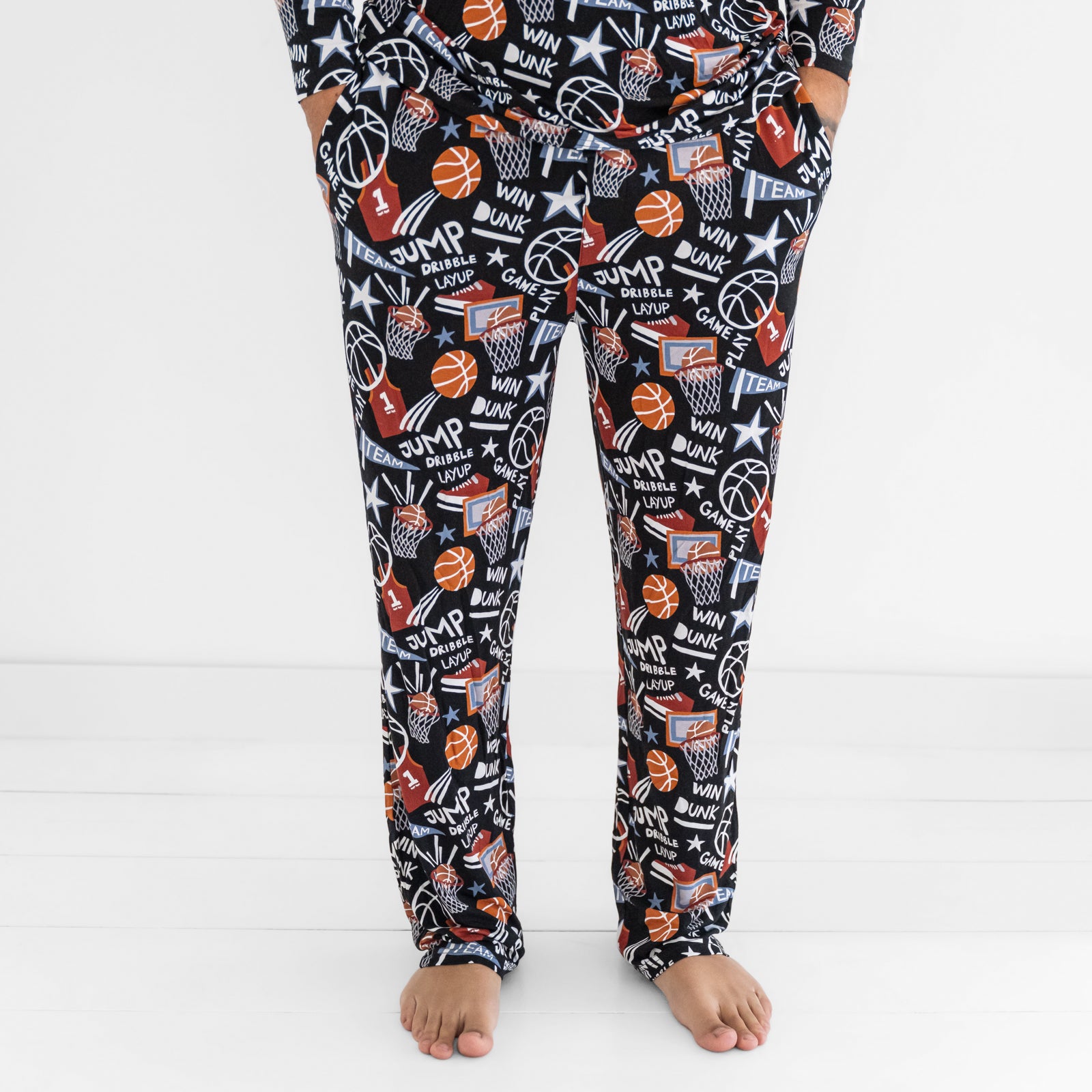 Front view of a man wearing the Black Slam Dunk mens bamboo pajama pants