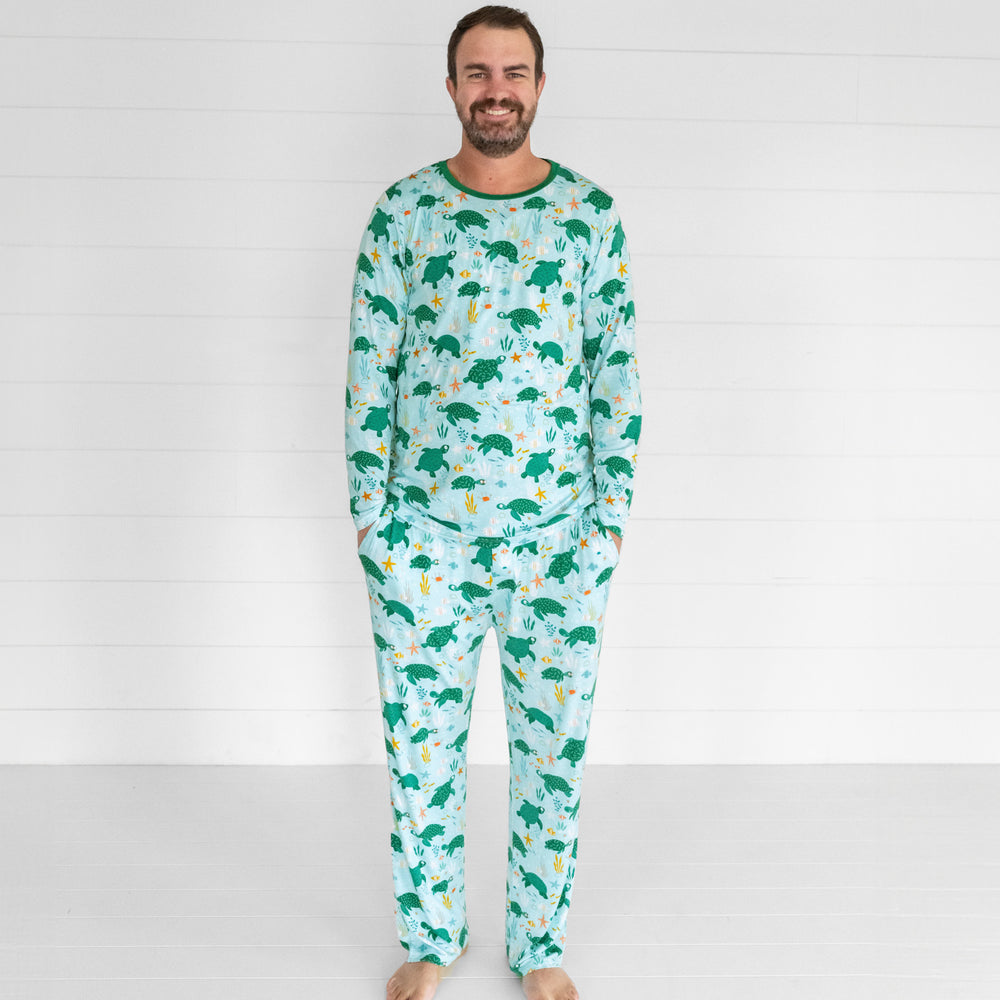 image of a man wearing Sea Turtle Friends men's pj pants and matching men's pj top