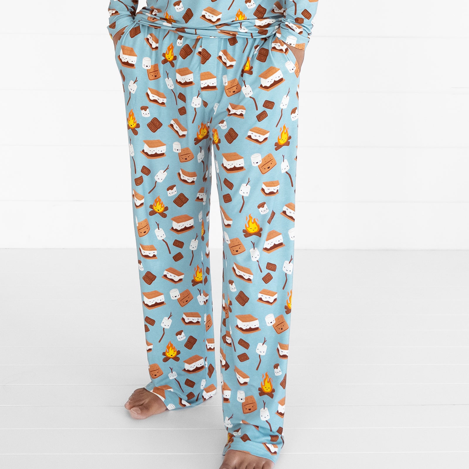 Close up image of a man wearing S'mores Galore men's pj pants