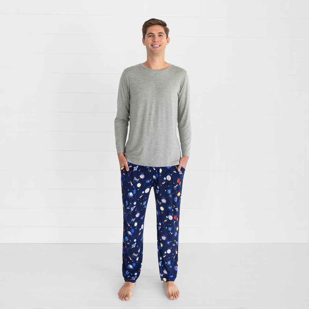 Image of a man wearing Through My Telescope men's pj pants and a men's Heather Gray pj top