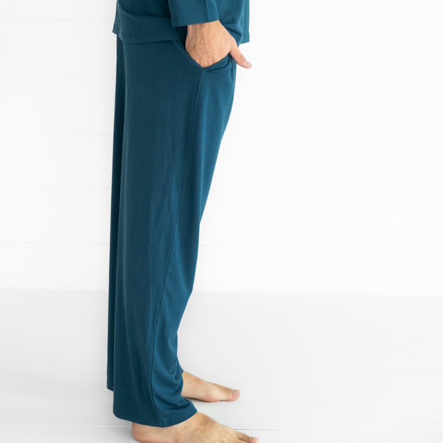 Close up profile image of a man wearing Cozy Twilight Teal pj pants