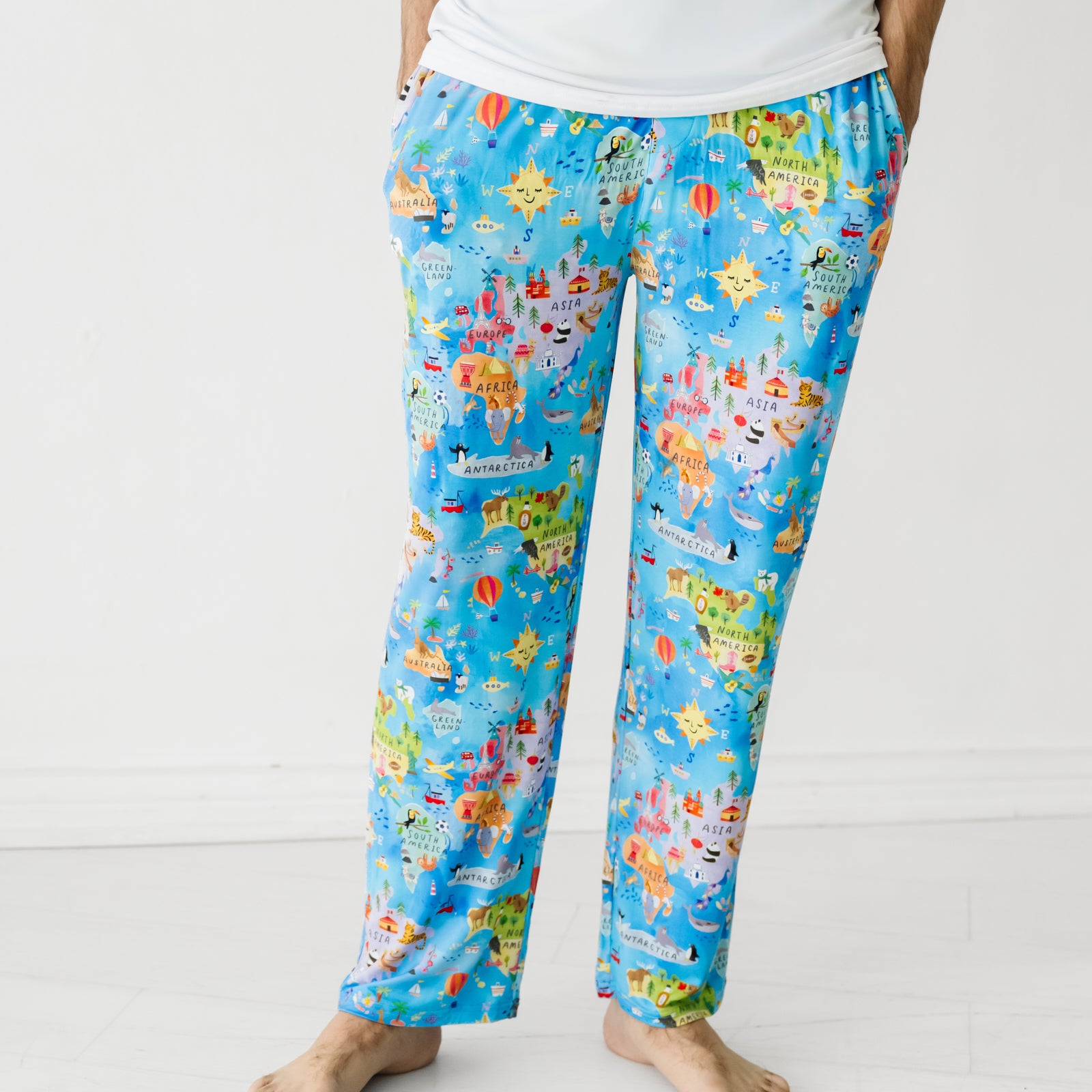 Close up image of a man wearing Around the World men's pajama pants