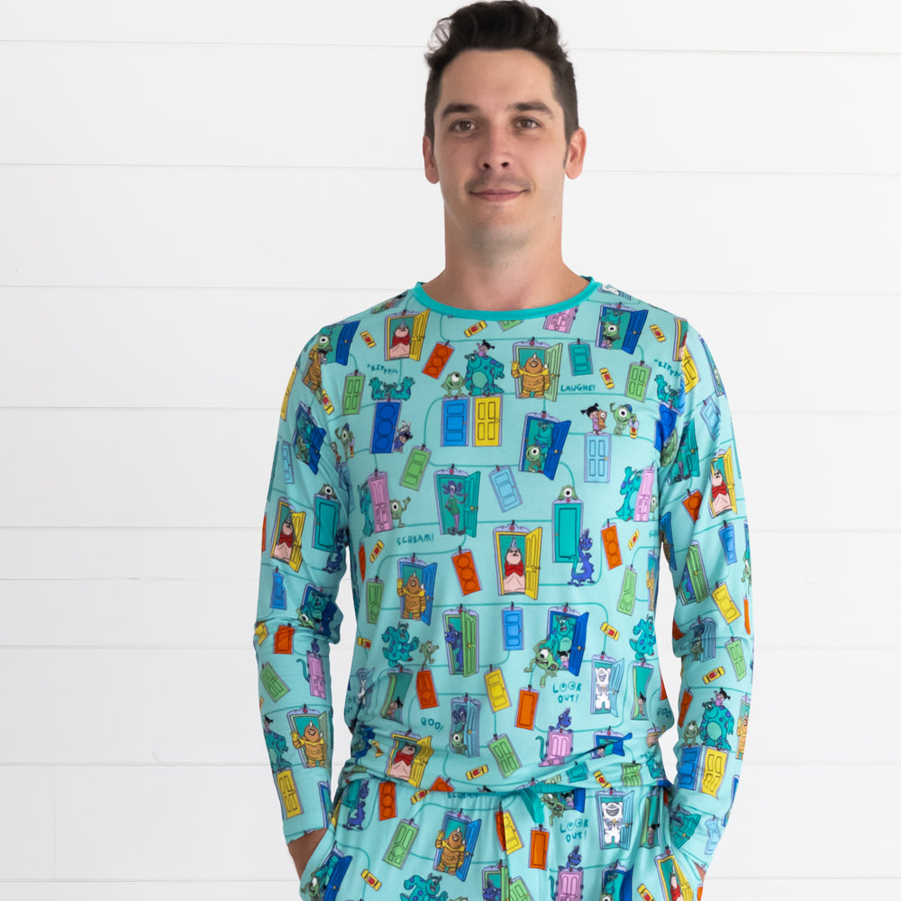 Male model wearing the Disney Monsters, Inc. Scream Team Men's Pajama Top