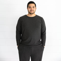 close up image of a man wearing a Cozy heather black men's pj top