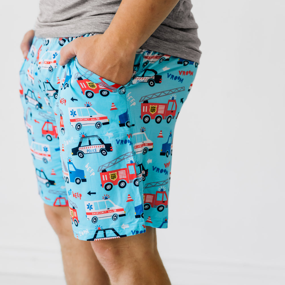 Alternate close up image of a man wearing a men's To the Rescue pj shorts