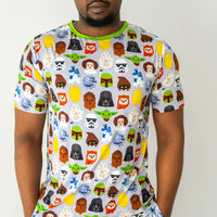 Close up image of a man wearing a Legends of the Galaxy men's short sleeve pajama top