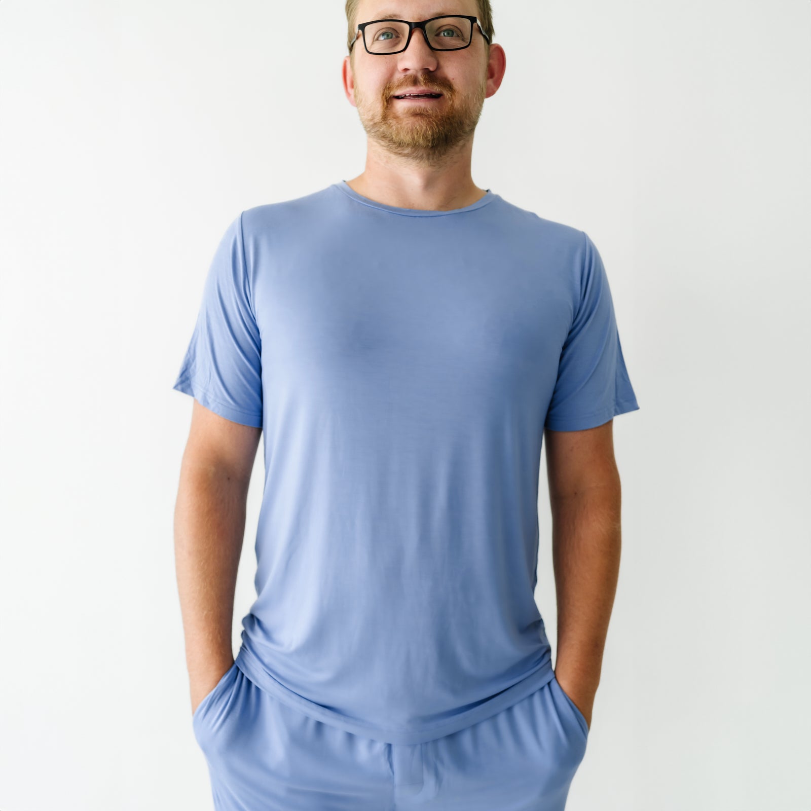 Close up image of a man wearing Slate Blue men's short sleeve pajama top 