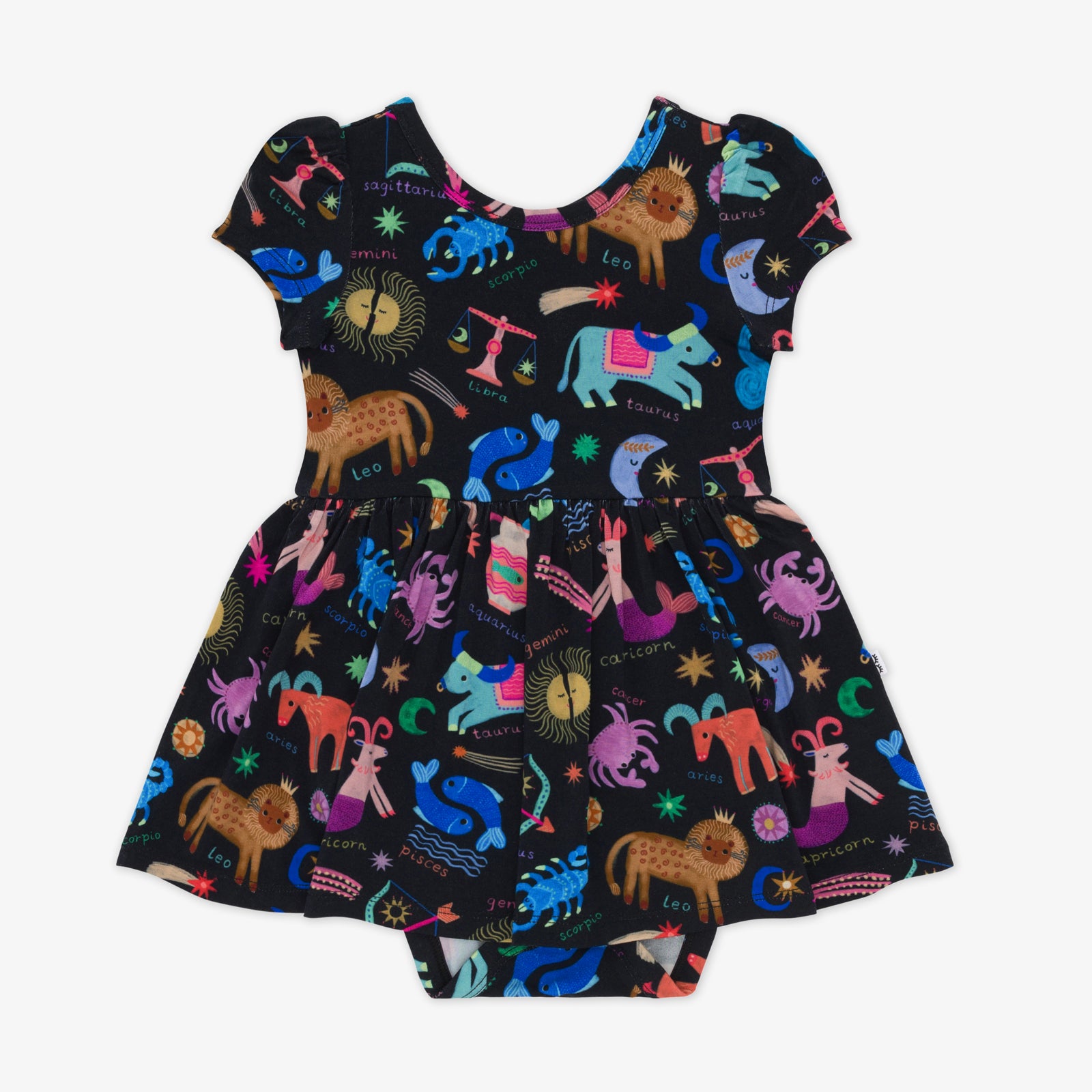 Flat lay of a star signs skater dress with bodysuit featuring multicolored drawings of the zodiac signs on a black background