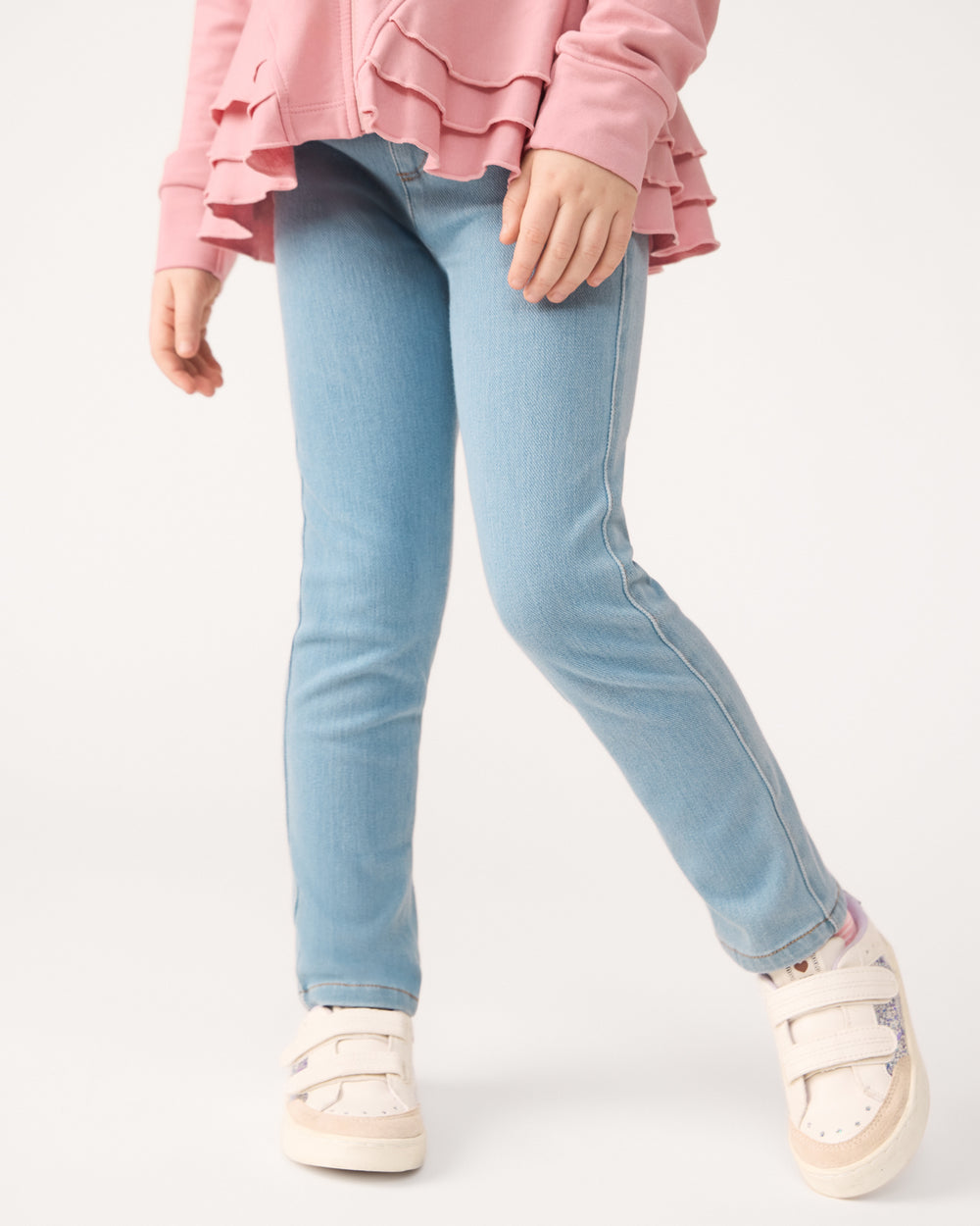 Close up of girl wearing the Light Blue Denim Jegging