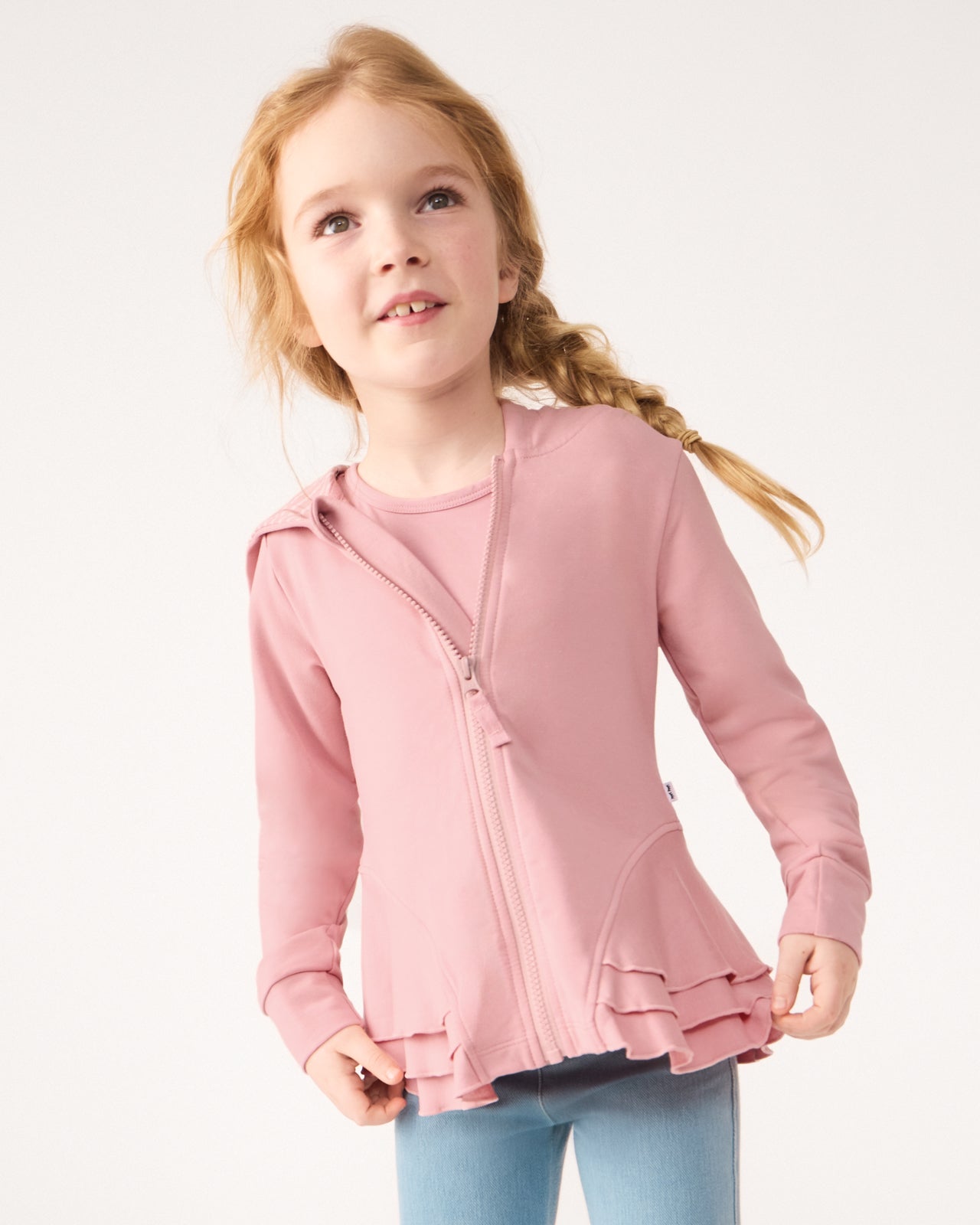 Girl wearing the Mauve Blush Peplum Hoodie