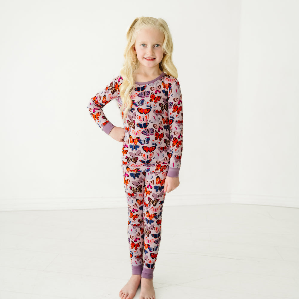 Child wearing a Butterfly Kisses two-piece pajama set