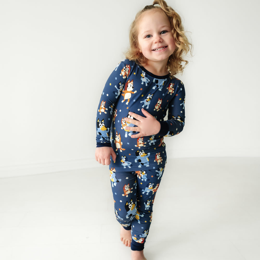 Alternate image of a child dancing wearing a Bluey Dance Mode two piece pajama set