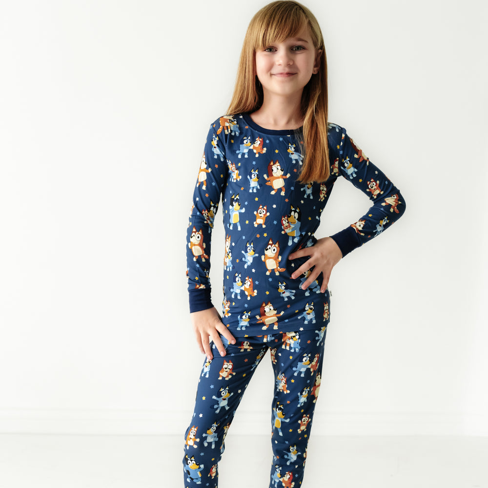 Alternate image of a child posing wearing a Bluey Dance Mode two piece pajama set