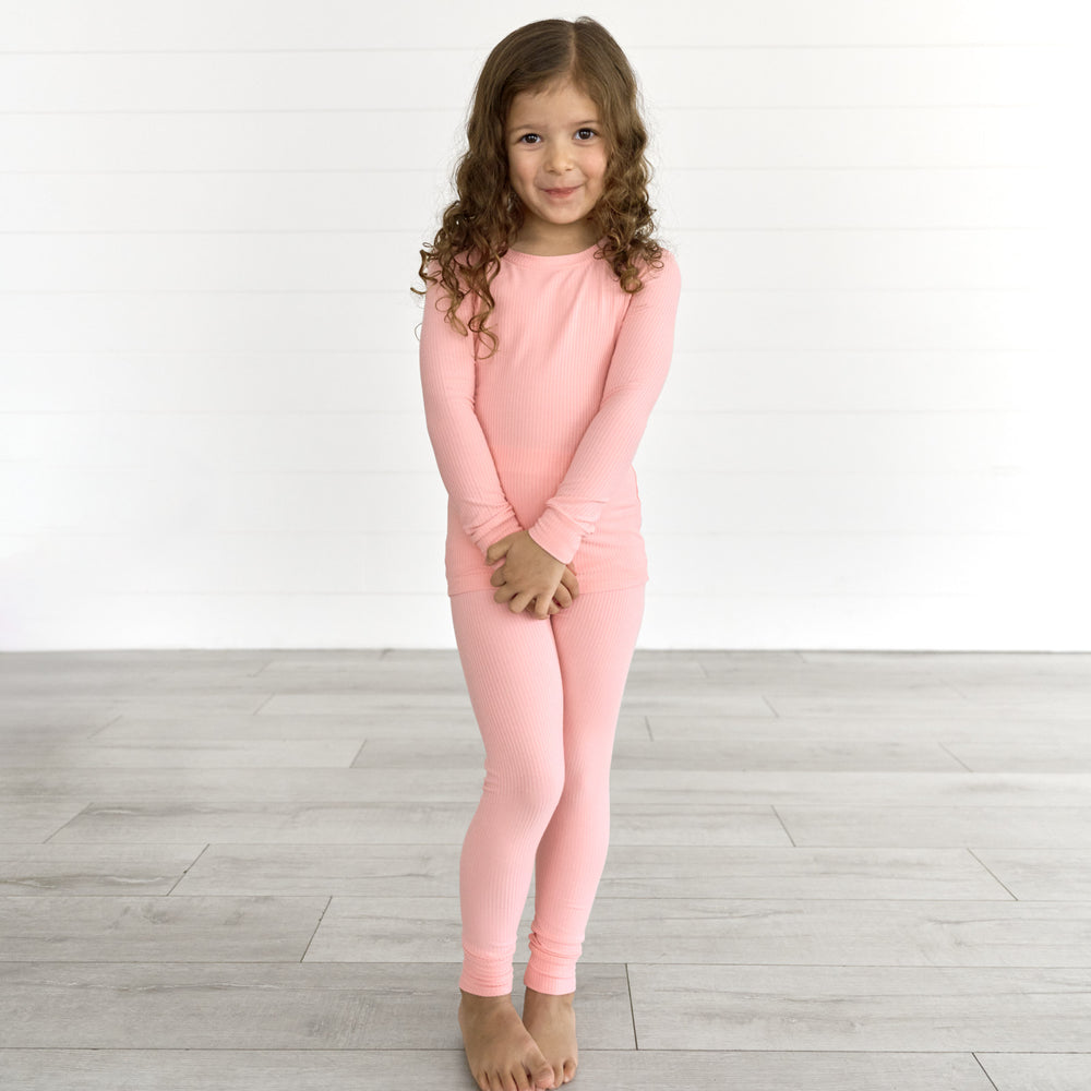 Girl posing in the Bubblegum Ribbed Two-Piece Pajama Set