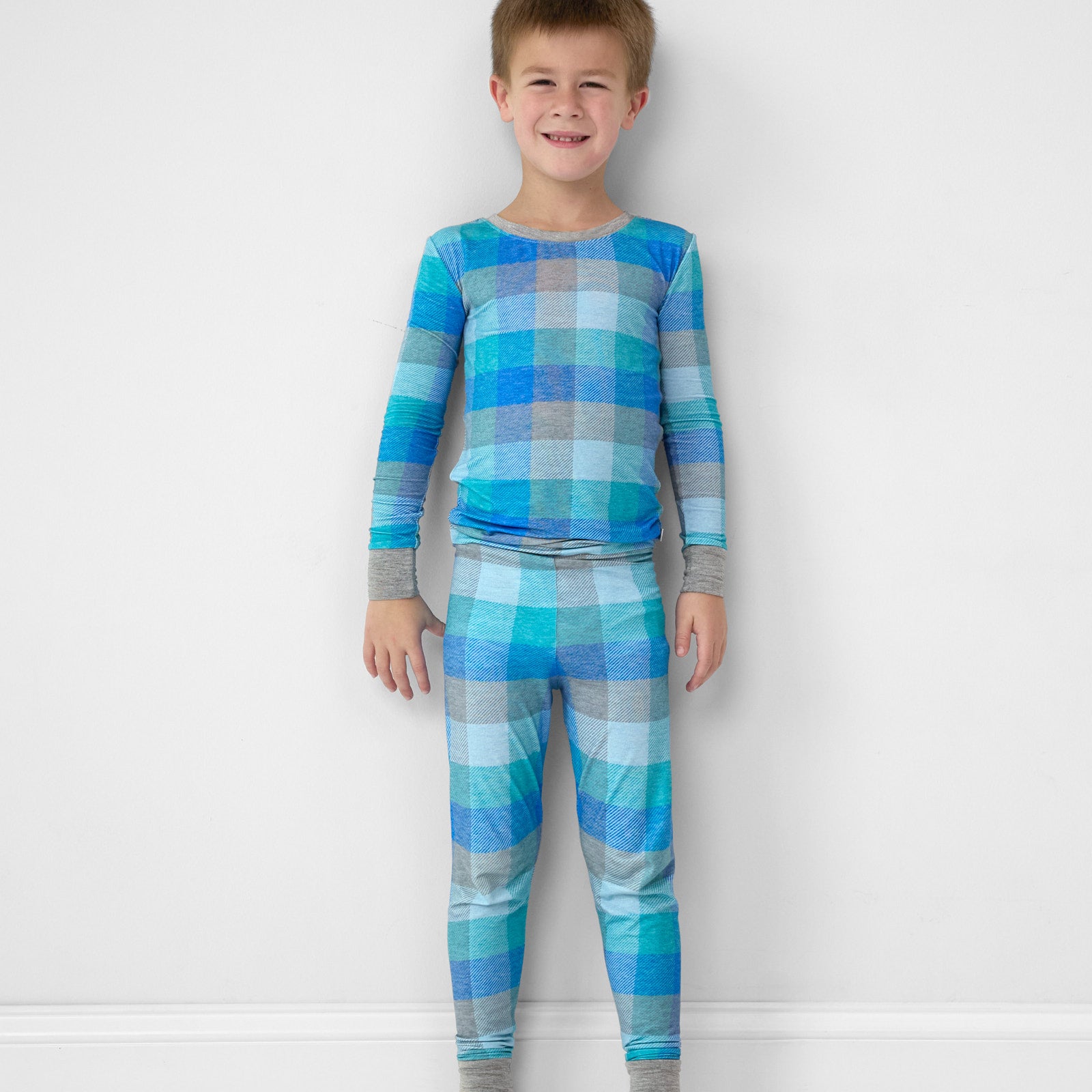 child wearing an Arctic Plaid two piece pj set