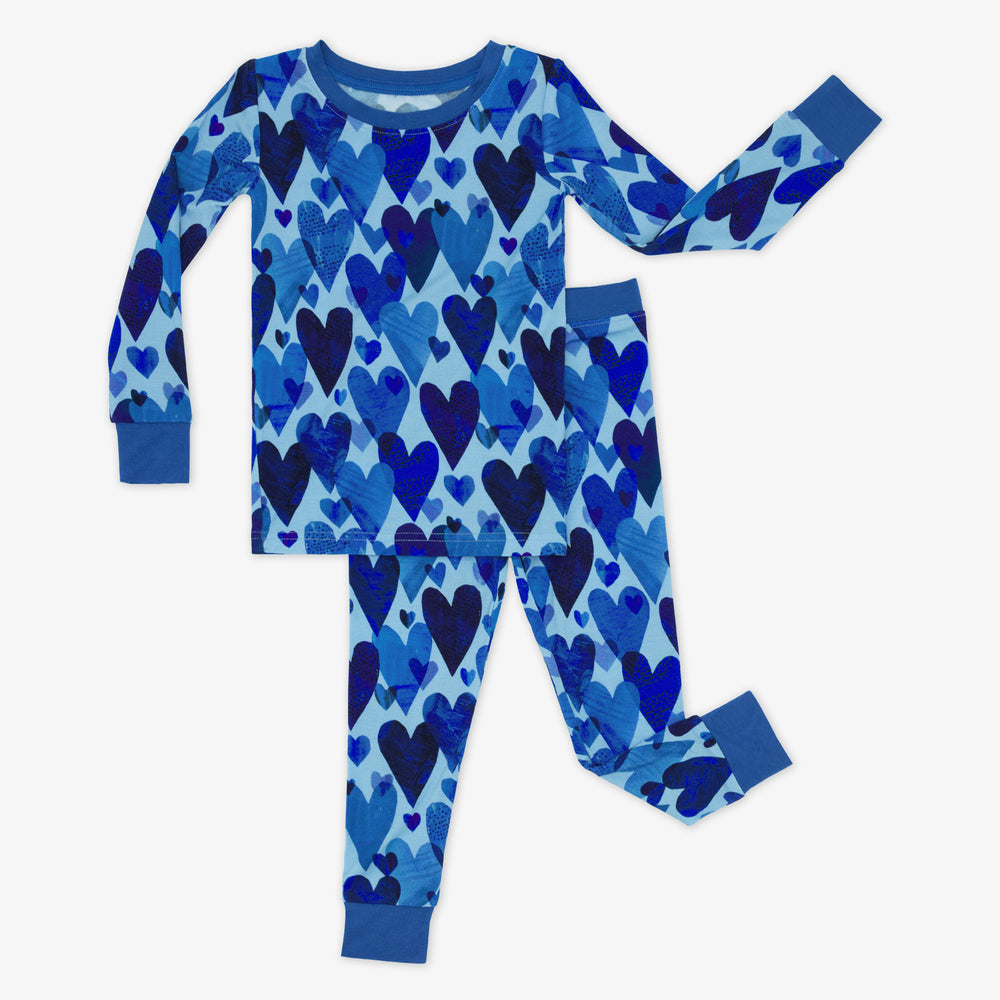 Flat lay of Blue Hearts & Crafts two-piece long sleeve and pants pajama set.