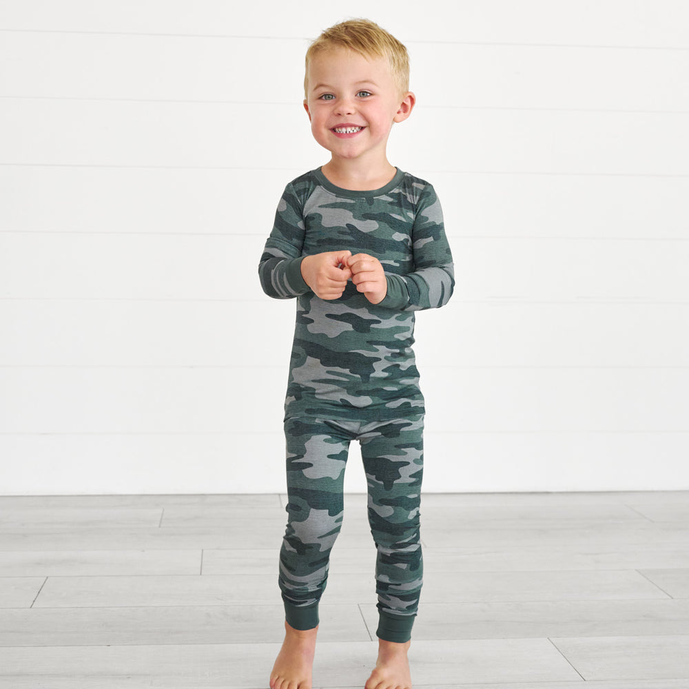 Boy wearing the Vintage Camo Two-Piece Pajama Set