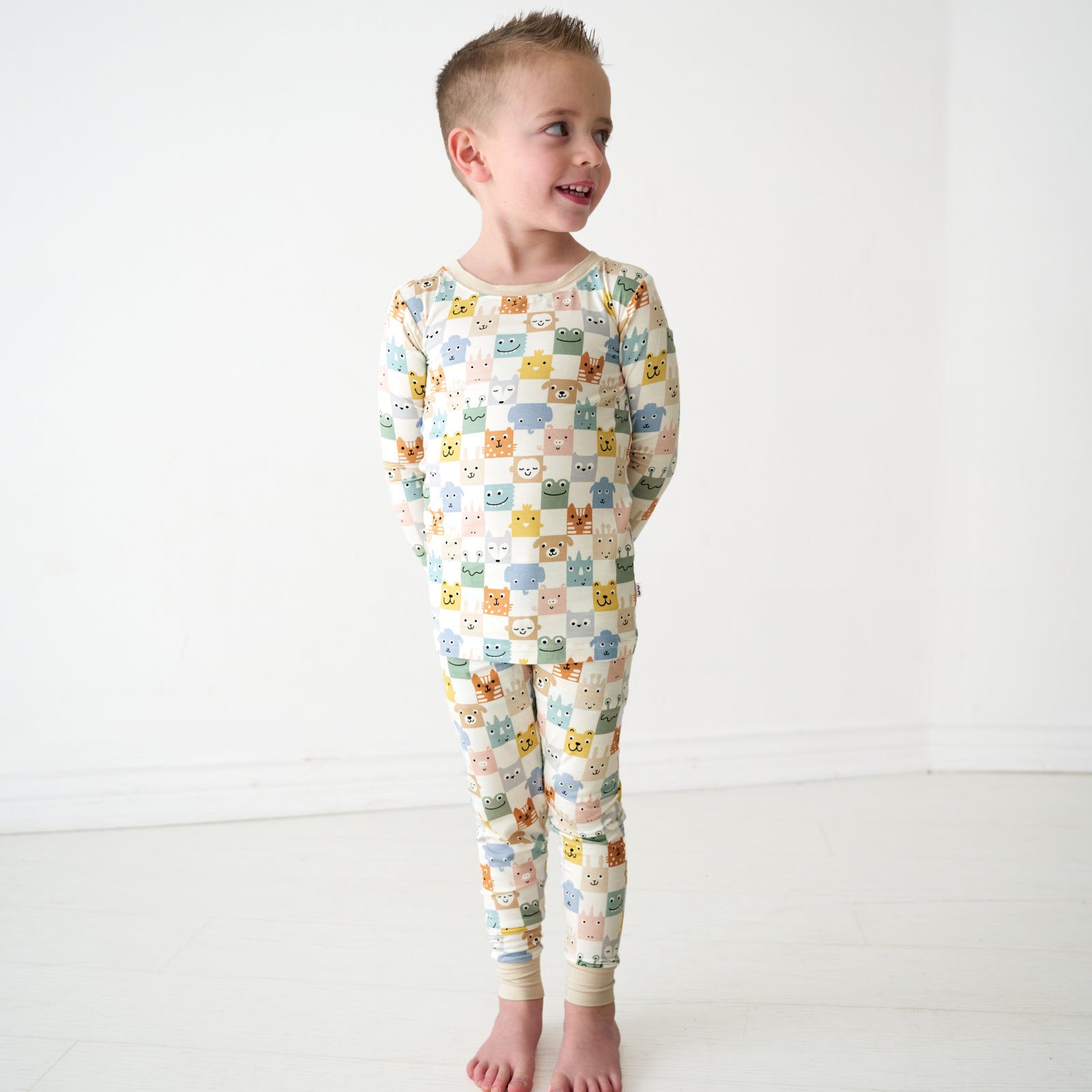 Alternate image of a child wearing a Check Mates two-piece pajama set