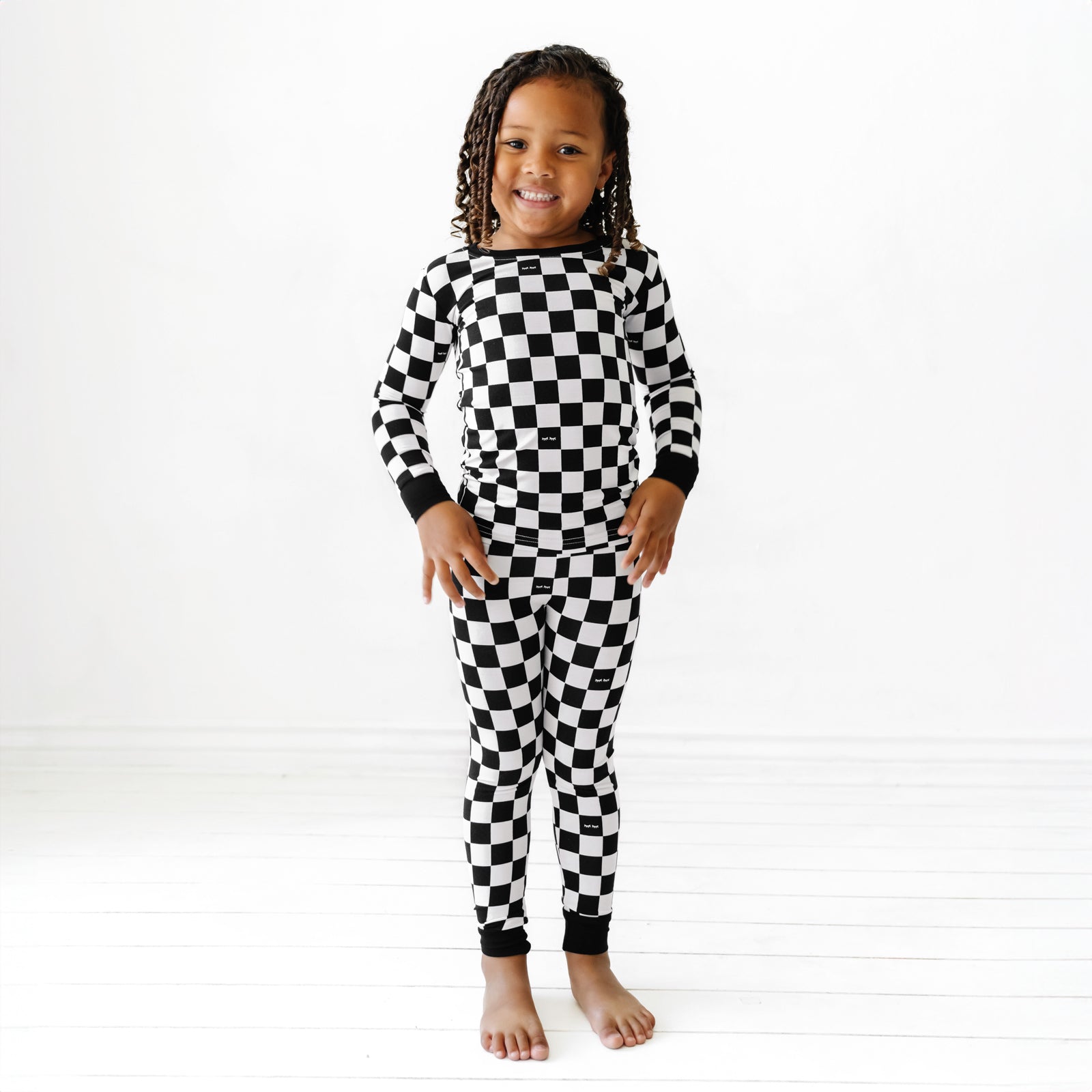 Alternate image of a child posing wearing Cool checks pj set