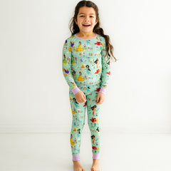 Child wearing a Disney Princess Dreams two-piece pajama set