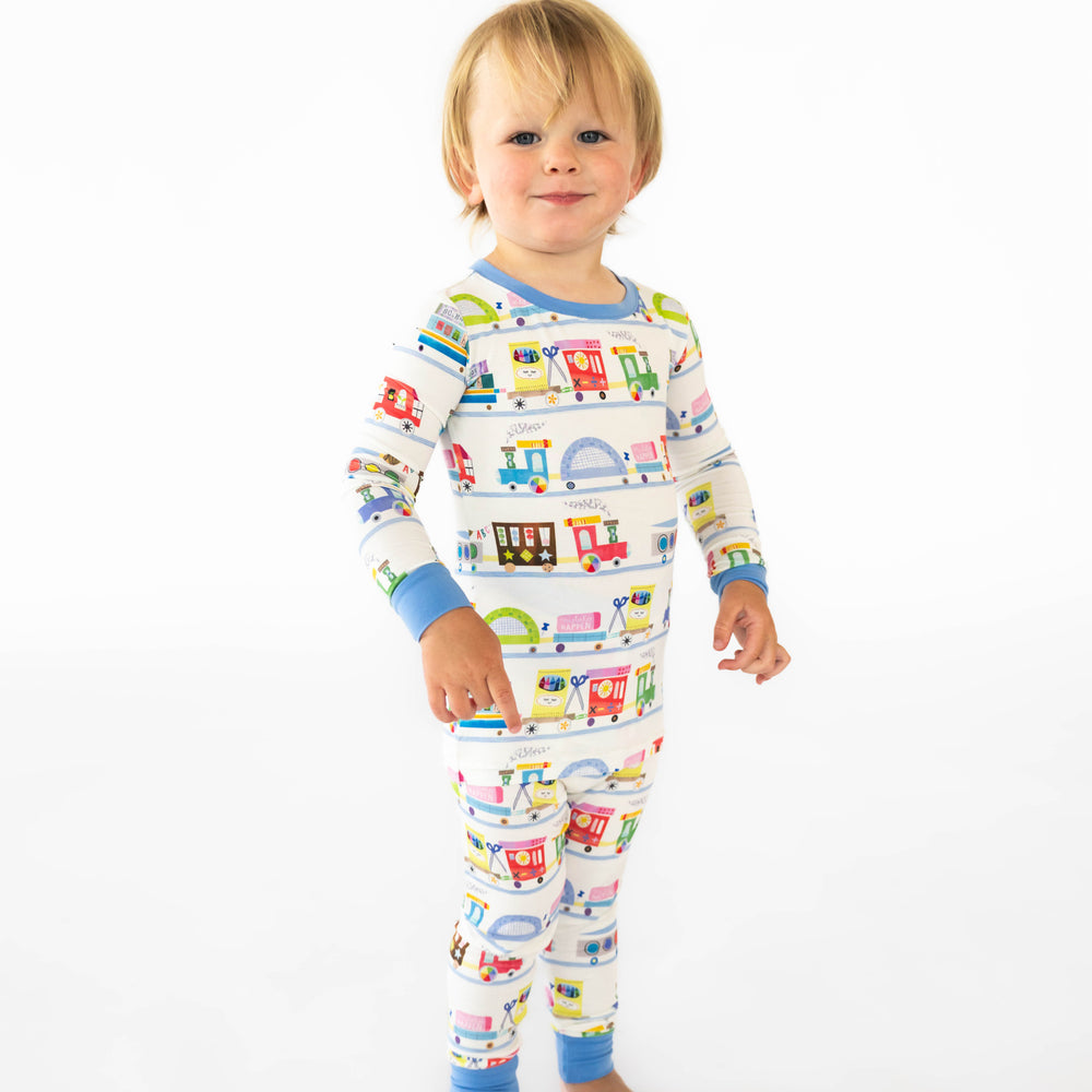 Alternative image of child standing while wearing the Education Express Two-Piece Pajama Set