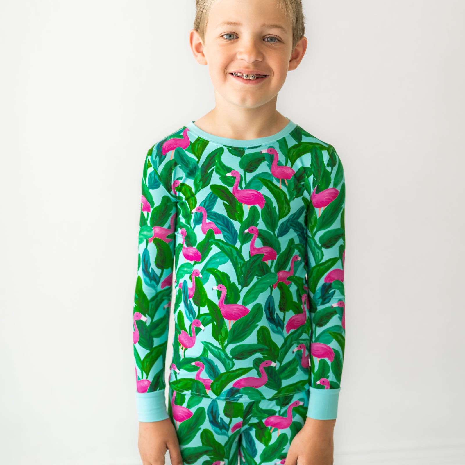 Close up image of a child wearing a Palm Springs two piece pajama set