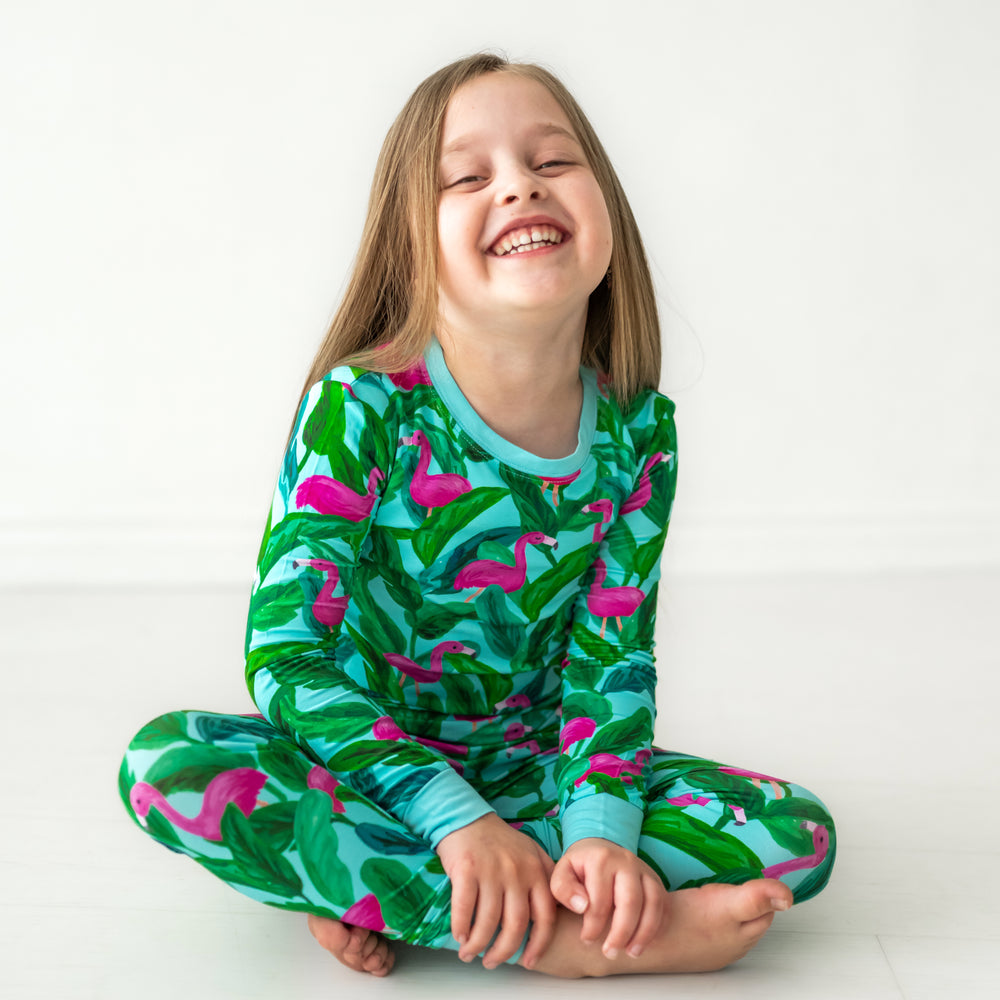 child sitting wearing Palm Springs two piece pajama set