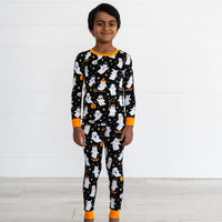 Boy wearing the Friendly Ghosts Two-Piece Pajama Set