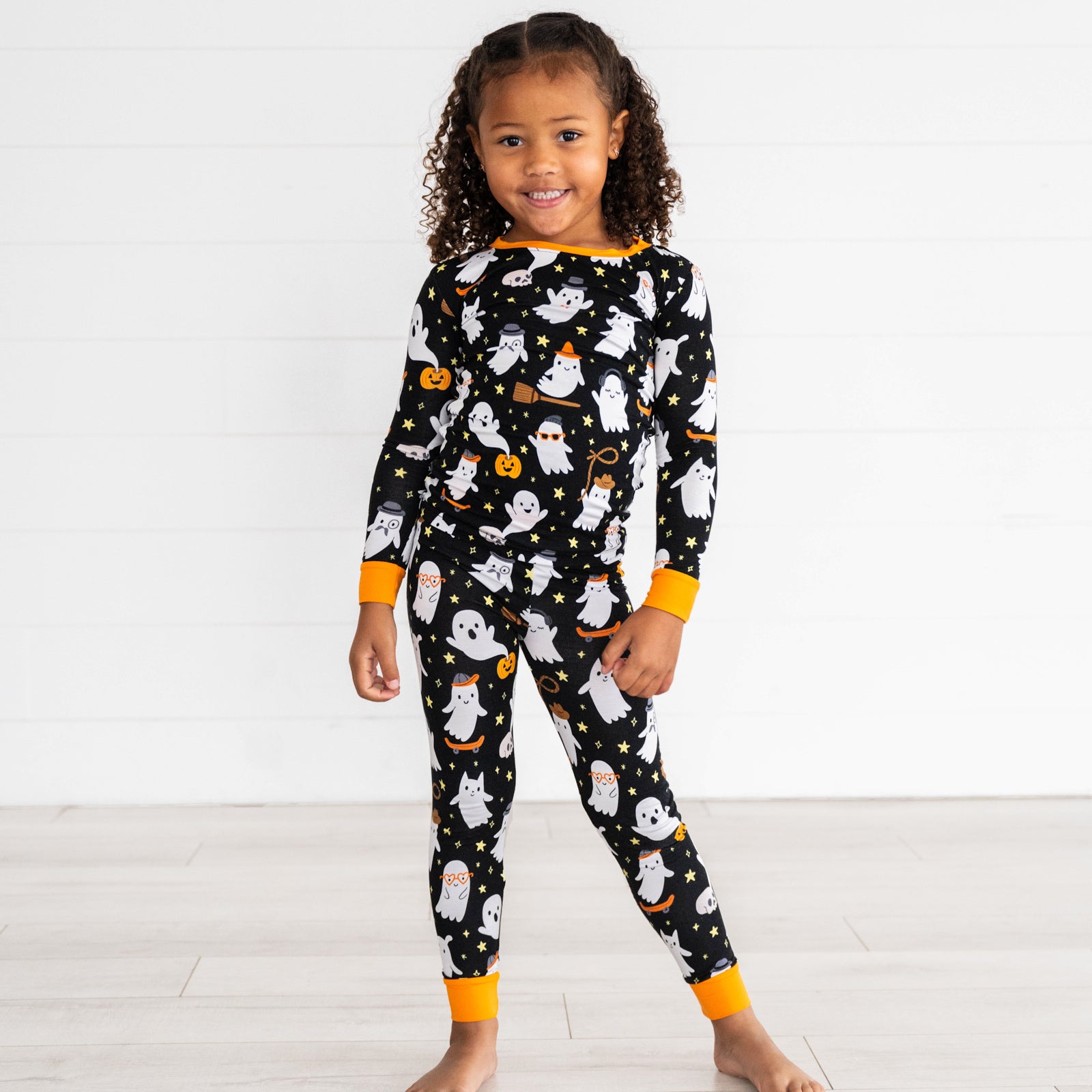 Girl posing in the Friendly Ghosts Two-Piece Pajama Set