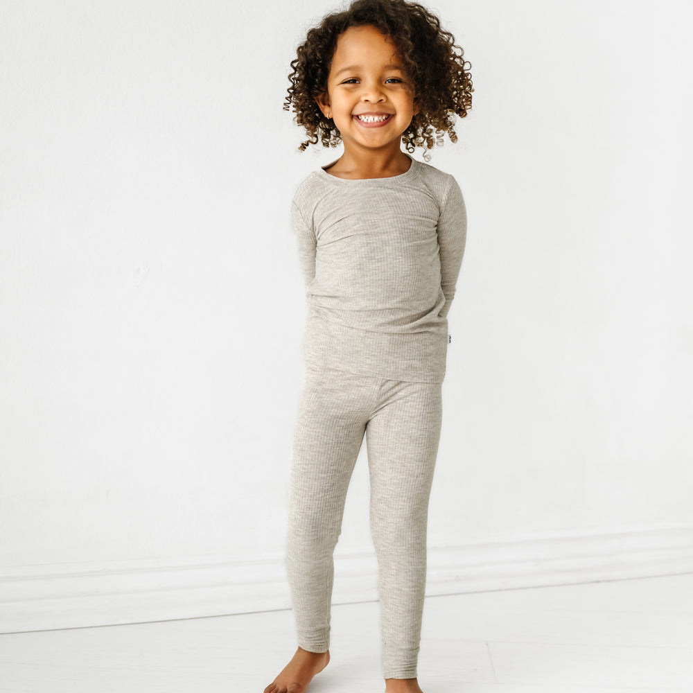 Child wearing a Heather Stone Ribbed two piece pajama set