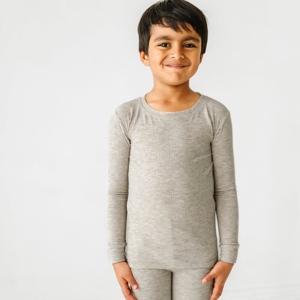 Click to see full screen - Close up image of a child wearing a Heather Stone Ribbed two piece pajama set