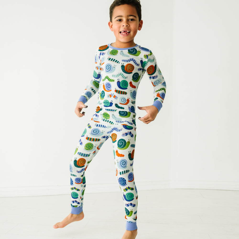 Child wearing an Inchin' Along two-piece pajama set