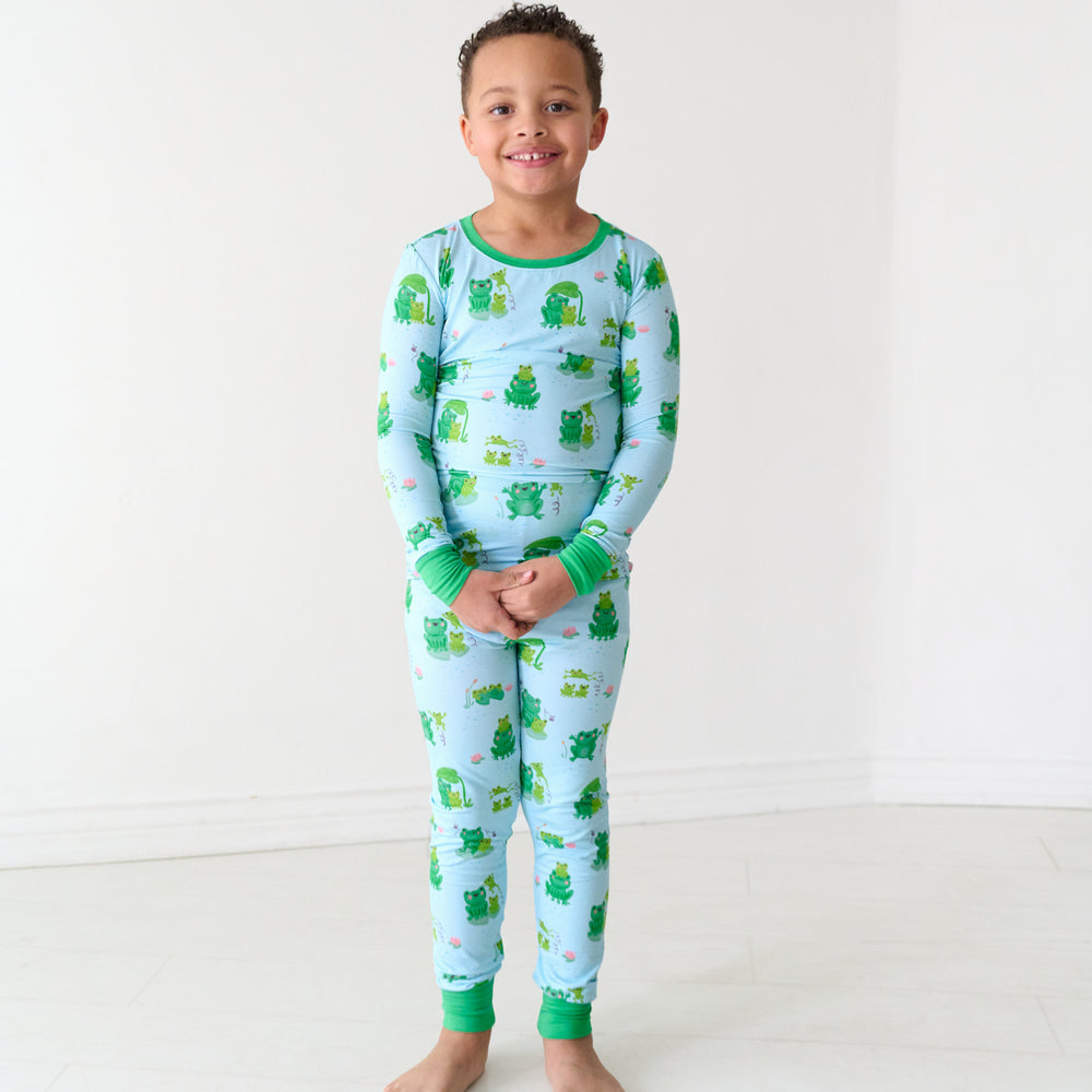 Child wearing a Leaping Love two-piece pajama set