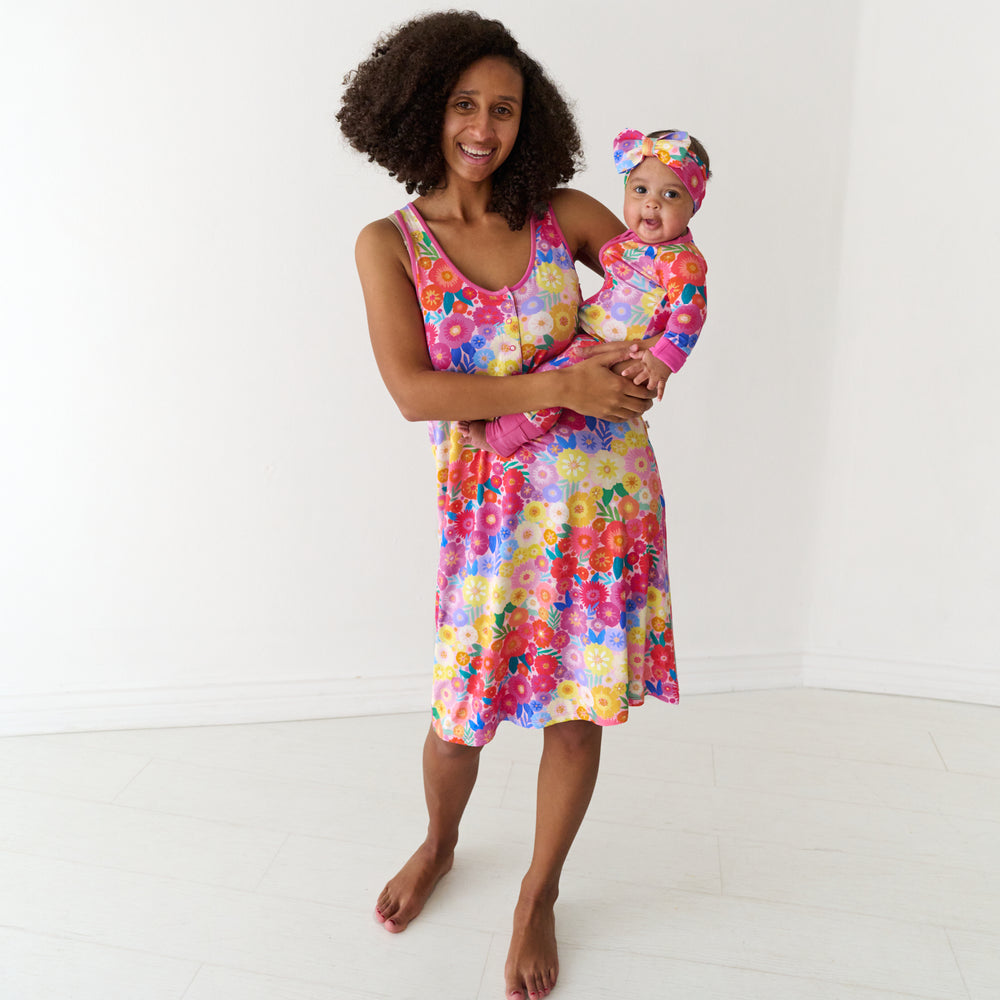 Mother and child wearing matching Rainbow Blooms pajamas