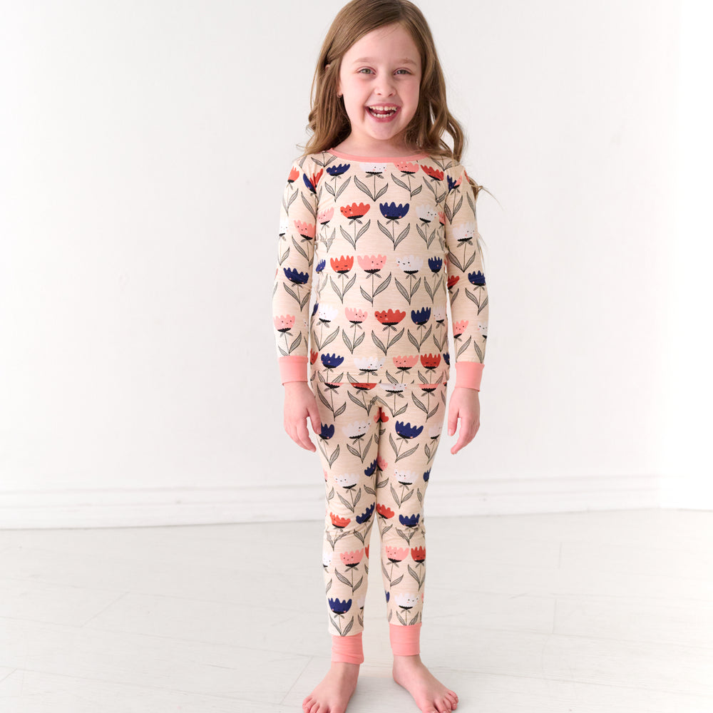 Child wearing a Flower Friends two-piece pajama set