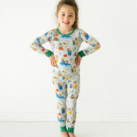 Child posing wearing a Papa Bear two piece pajama set