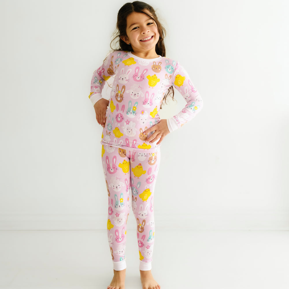 Click to see full screen - Child posing wearing Pink Pastel Parade two piece pajama set
