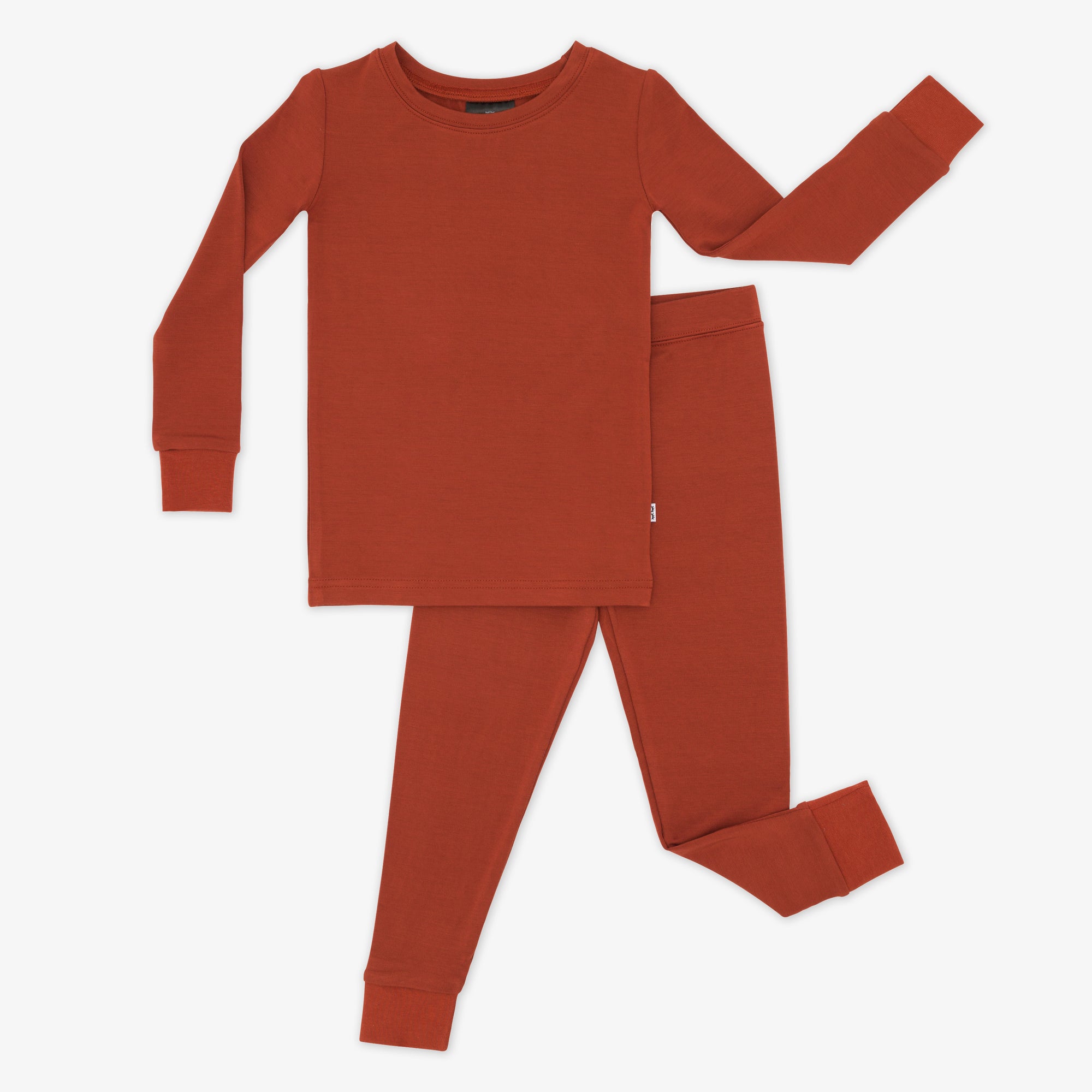 Flat lay image of a Cozy Rust two piece pj set