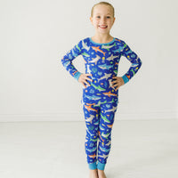 Child wearing a Rad Reef two-piece pajama set