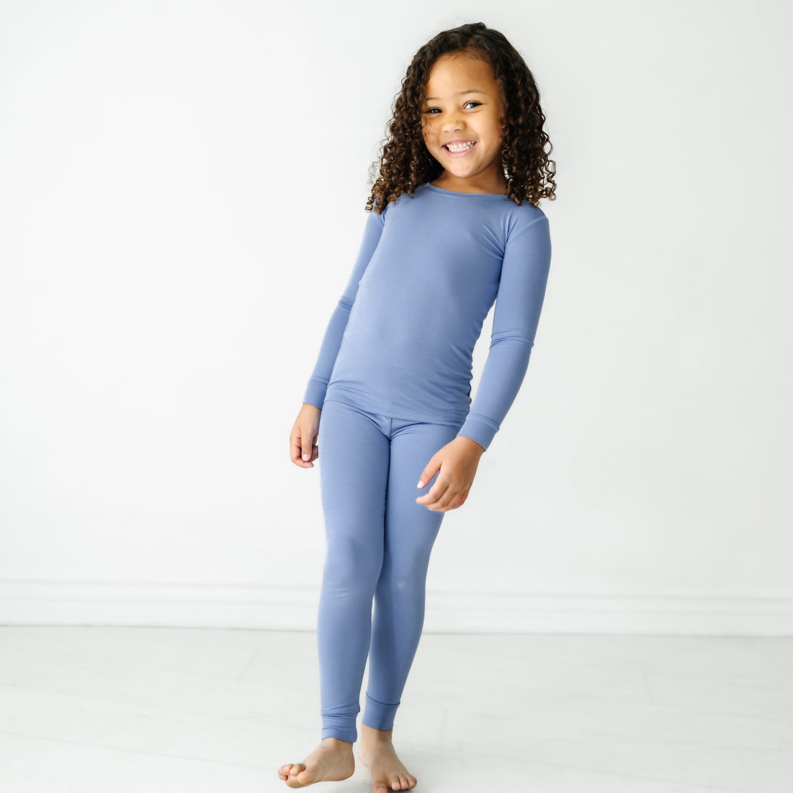 child wearing a Slate Blue two piece pajama set