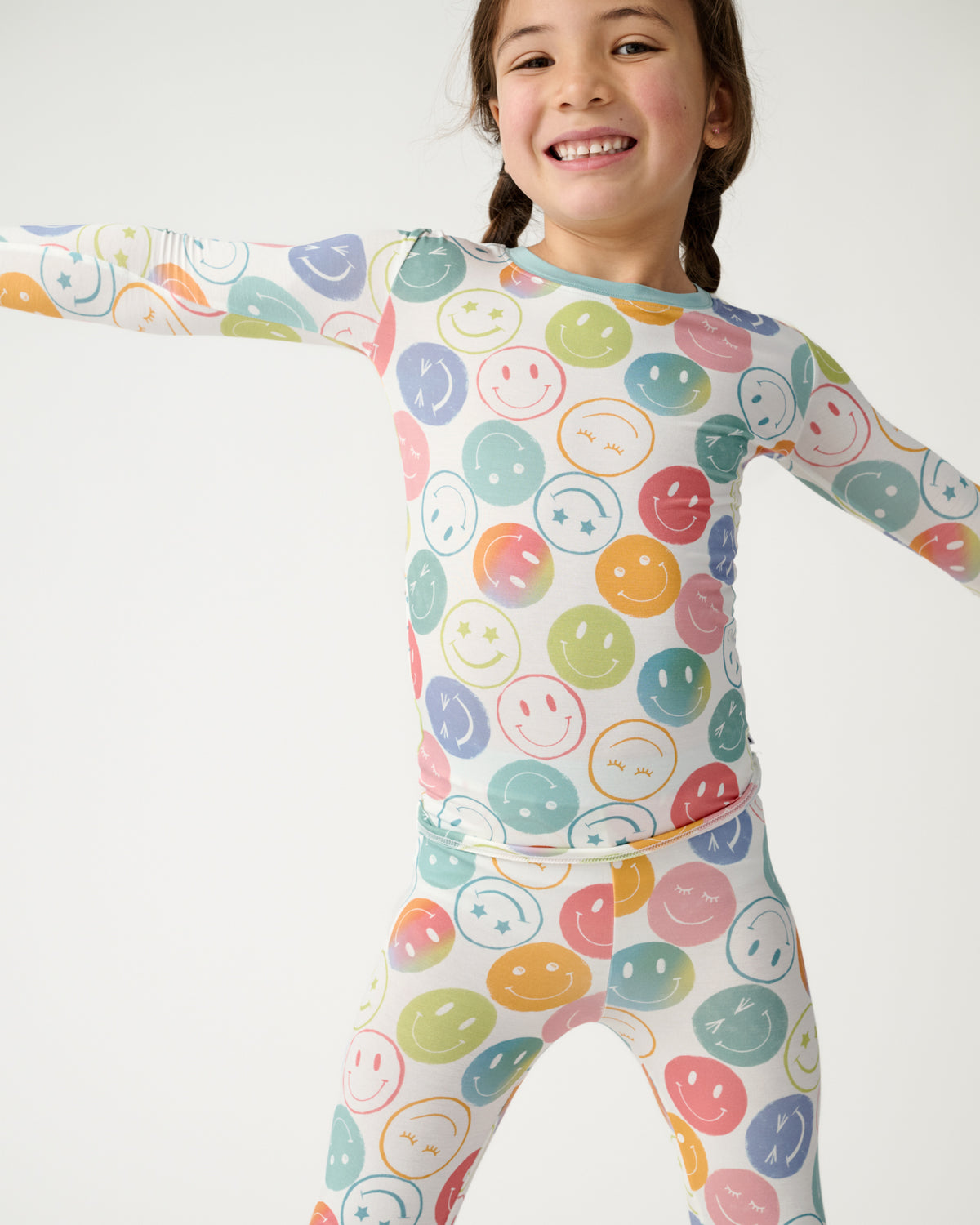 Posing child wearing the Positive Vibes Two-Piece Pajama Set