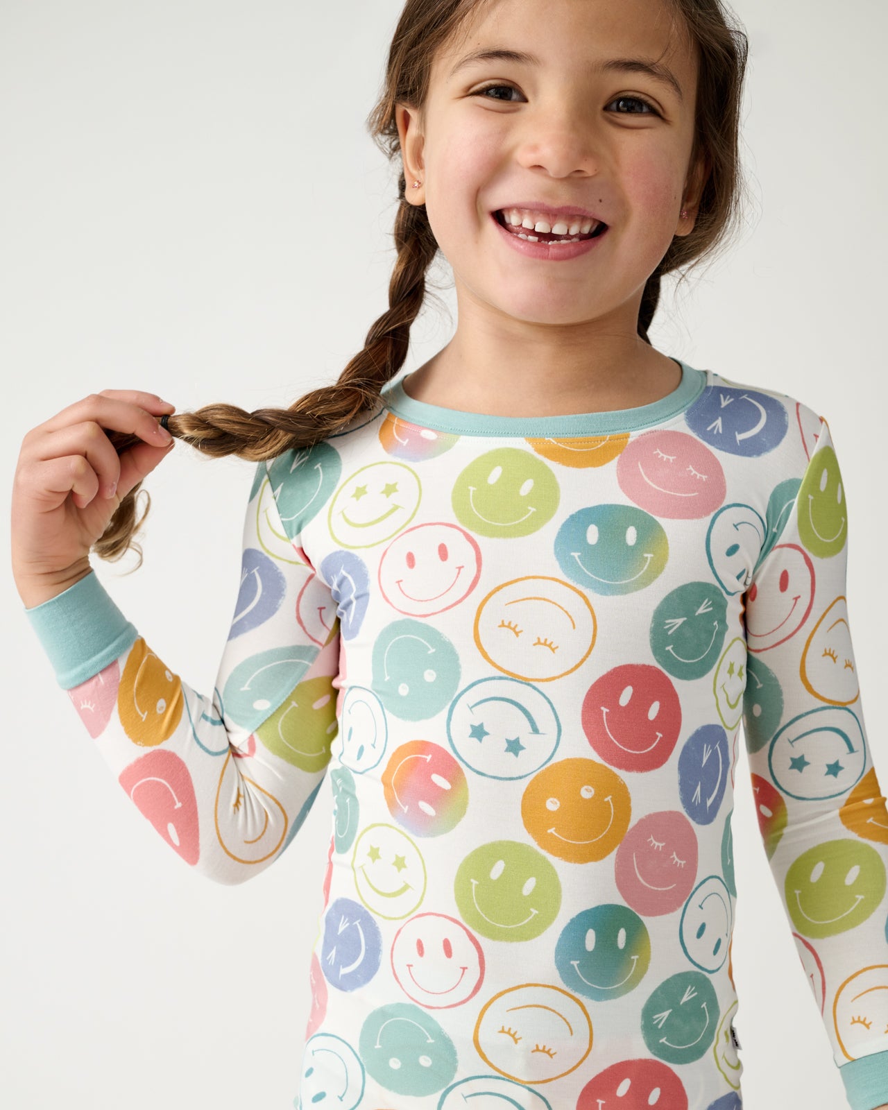 Close up of girl wearing the Positive Vibes Two-Piece Pajama Set