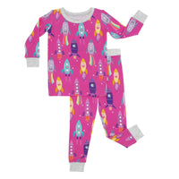 Flat lay image of Pink Space Explorer two piece pajama set