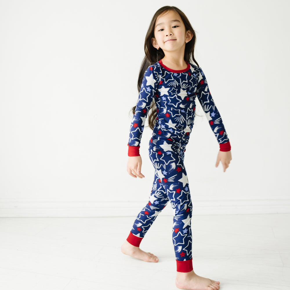 Child wearing a Star Spangled two piece pajama set