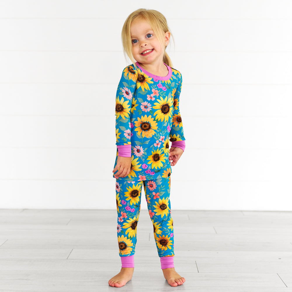 Girl posing while in the Sunflower Fields Two-Piece Pajama Set