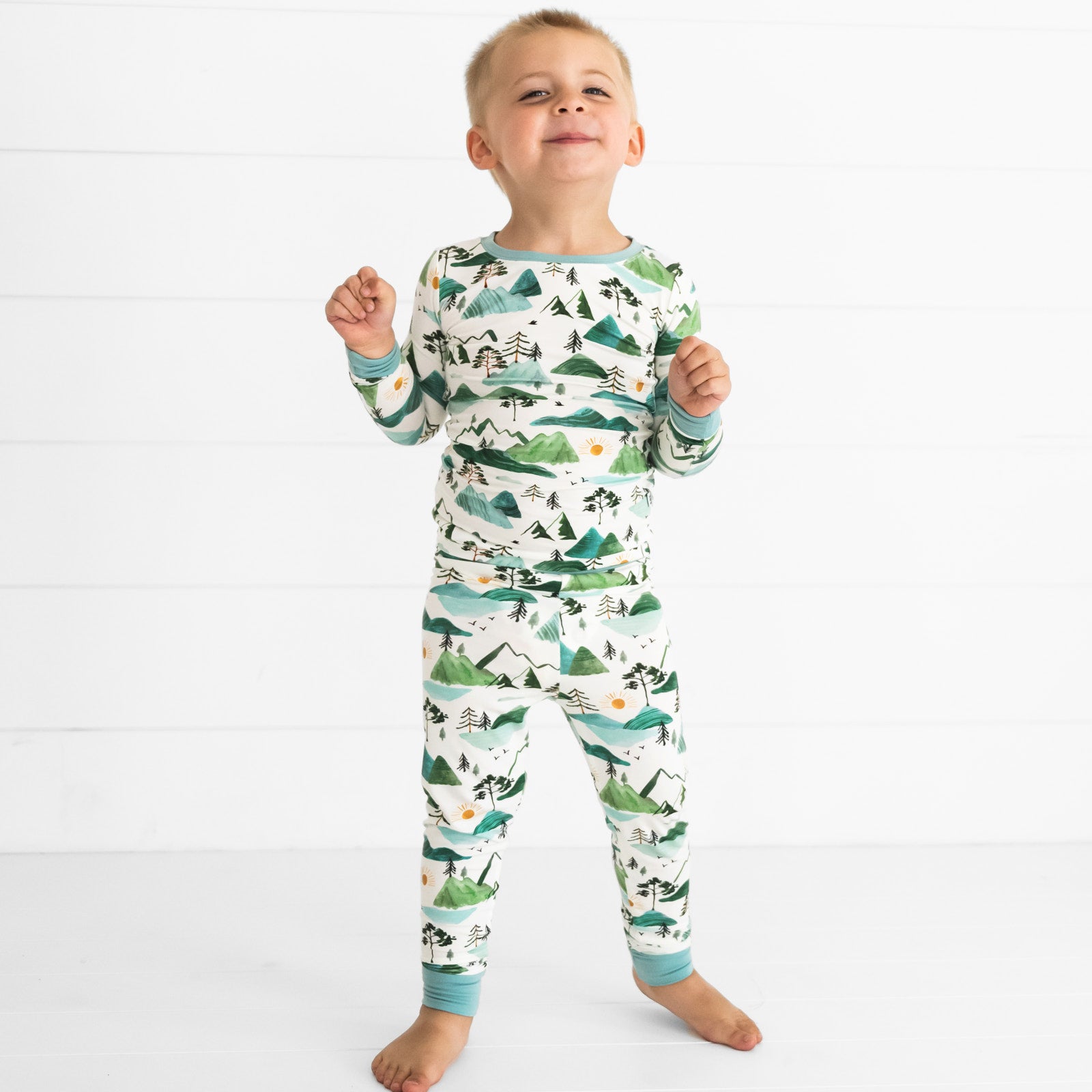 child dancing wearing a mountain mist two piece pajama set