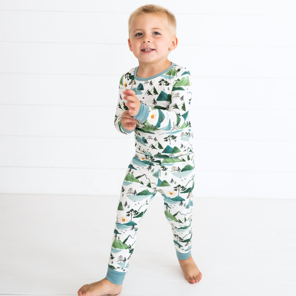 alternate image of a child dancing wearing a Mountain Mist two piece pj set